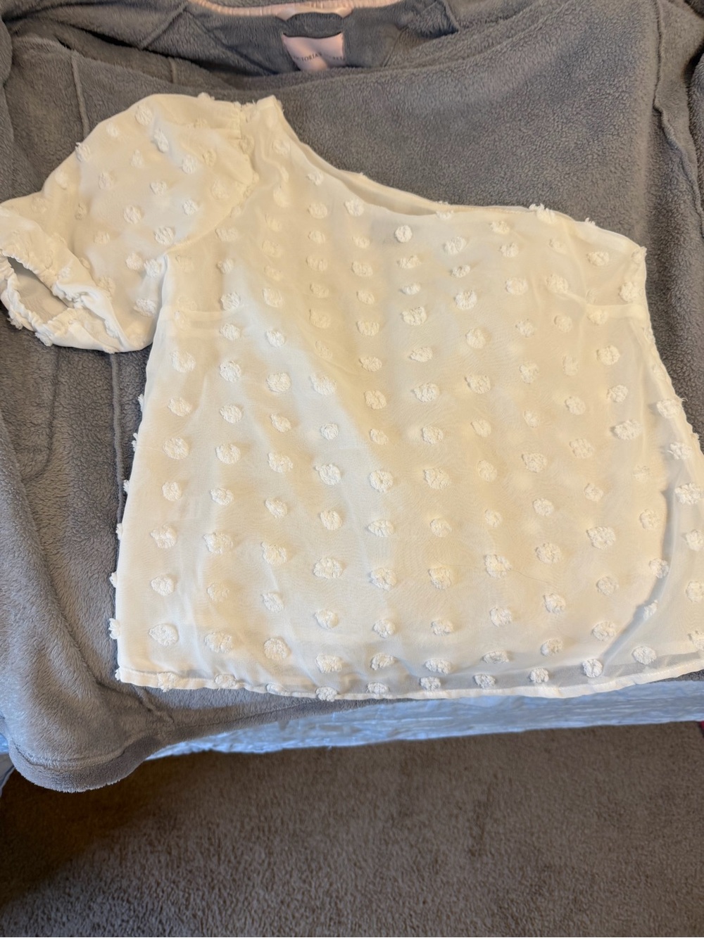 Versona Ivory One-Shoulder Swiss Dot Blouse